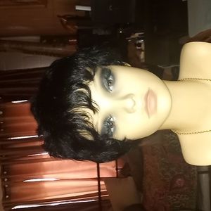 Short black  layered 100% Human  Hair wig. New without tags.